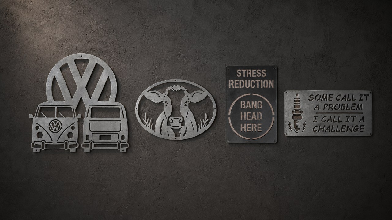 A collection of handmade raw-steel VW Camper, cow and novelty wall signs