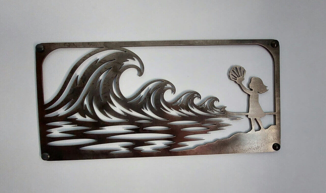Wave detail from a shell-themed steel wall art commission