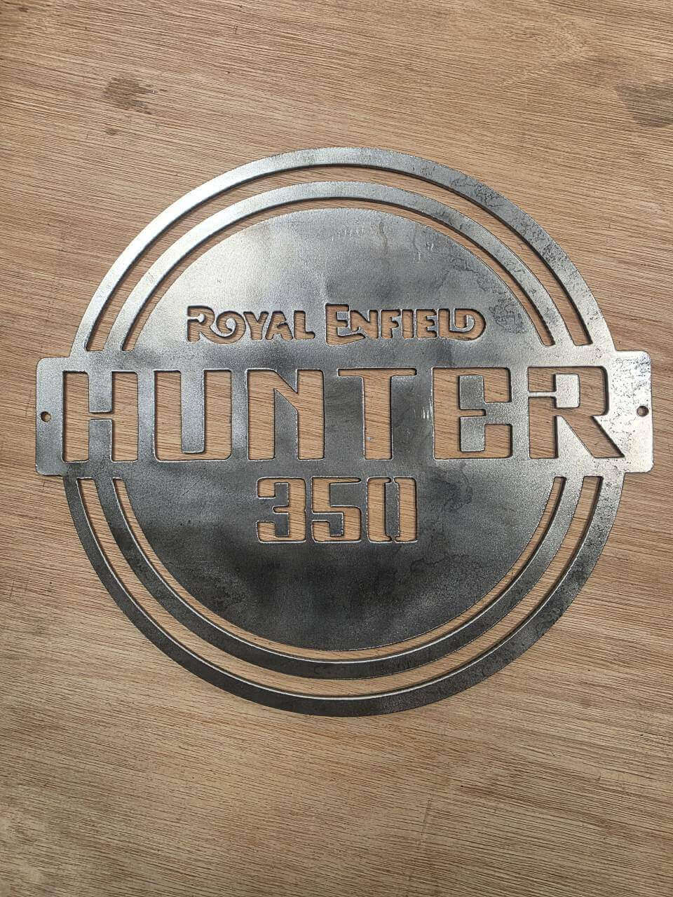 Royal Enfield Hunter 350 logo commissioned in cut steel