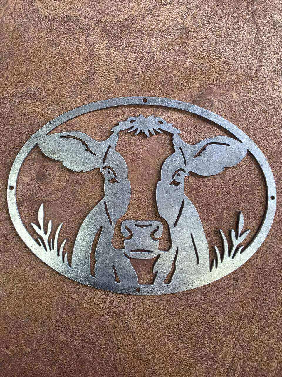 Cow metal sign plasma-cut from raw reclaimed steel