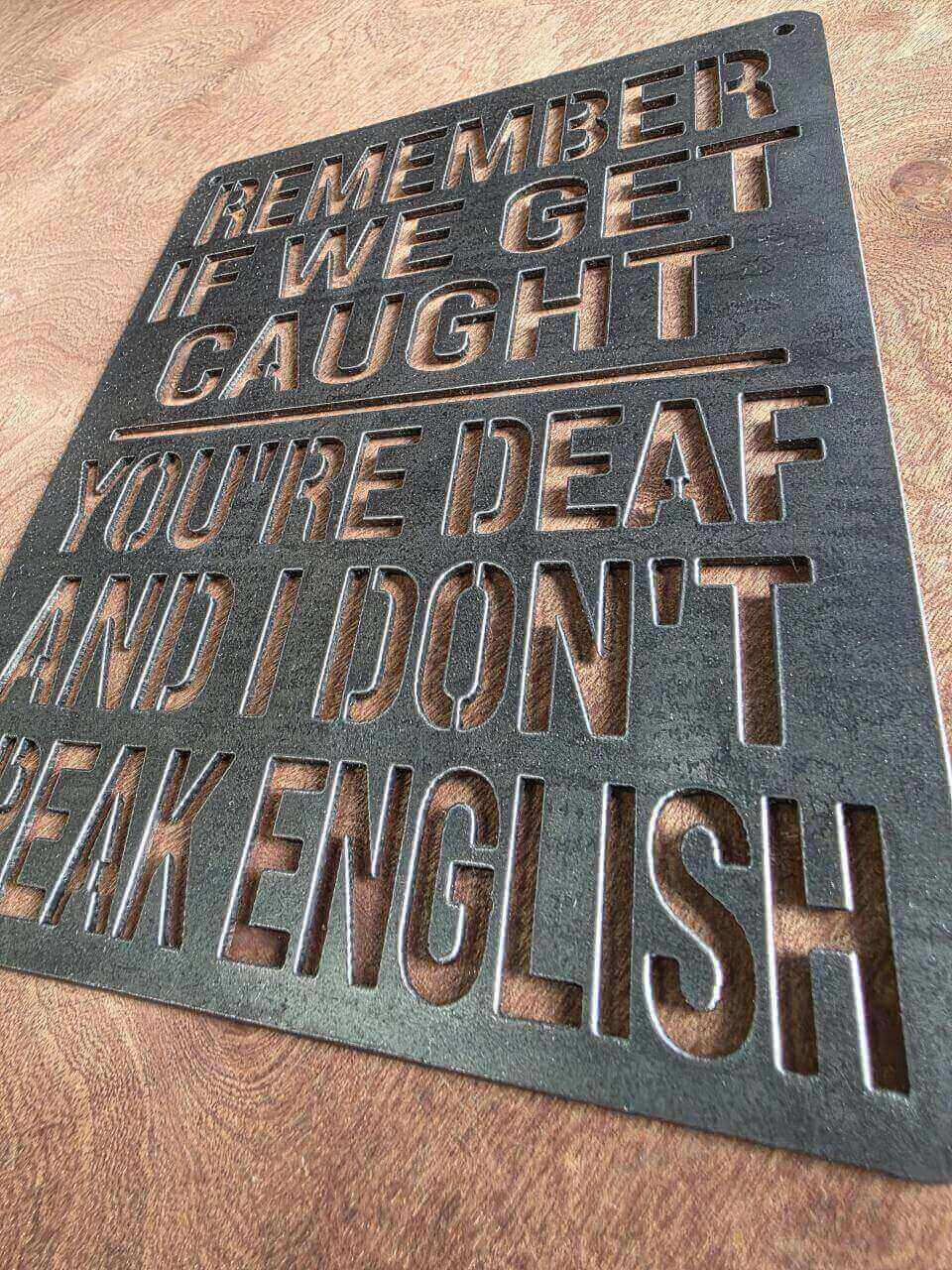 Close-angle view of funny deaf and do not speak English sign