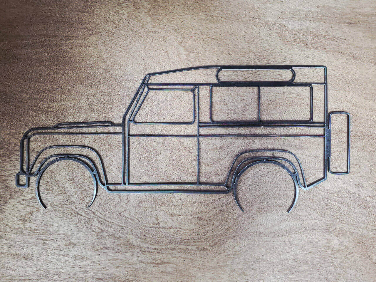 Land Rover Defender silhouette raw steel metal wall art