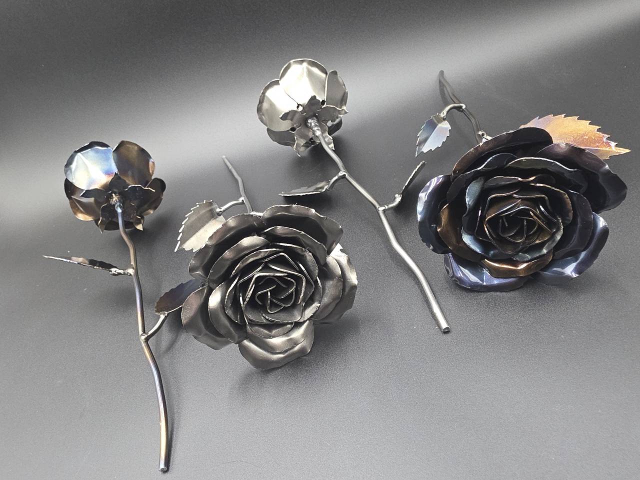 Raw-steel and heat-treated metal flowers handmade in the Rebuild Custom workshop