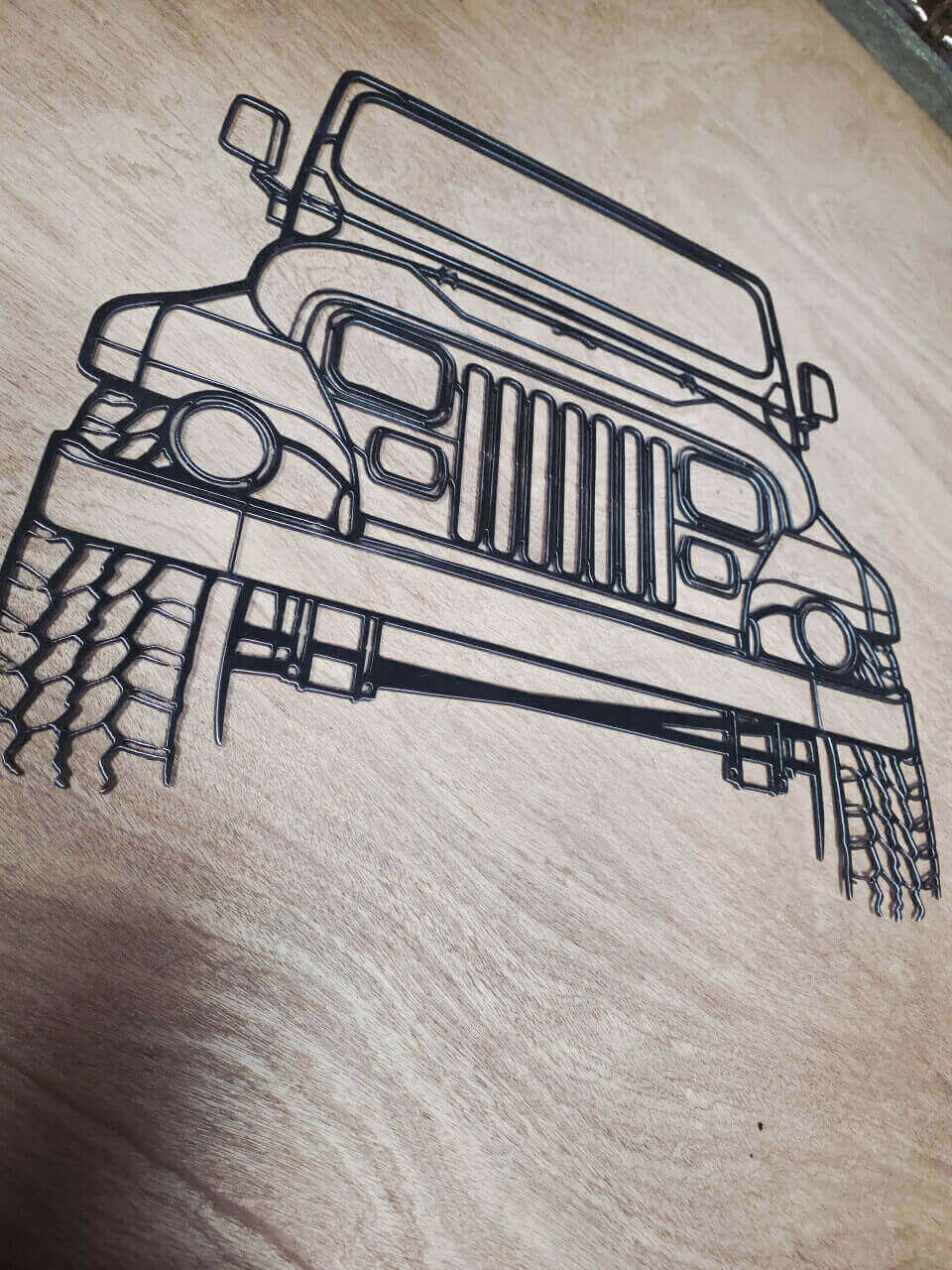 Jeep front-view raw steel metal wall art – angled product view