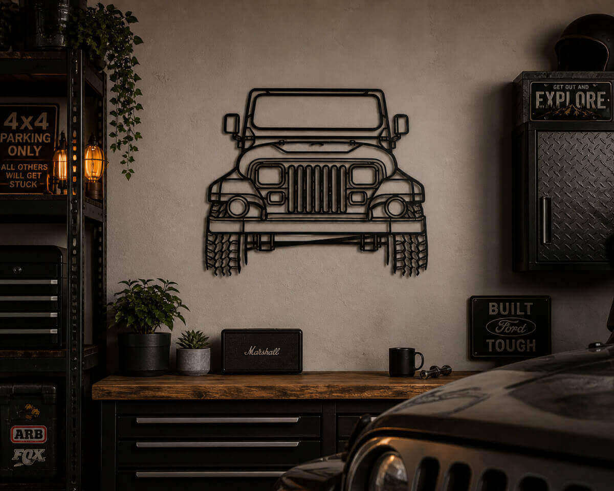 Jeep front-view metal wall art displayed in an industrial-style garage