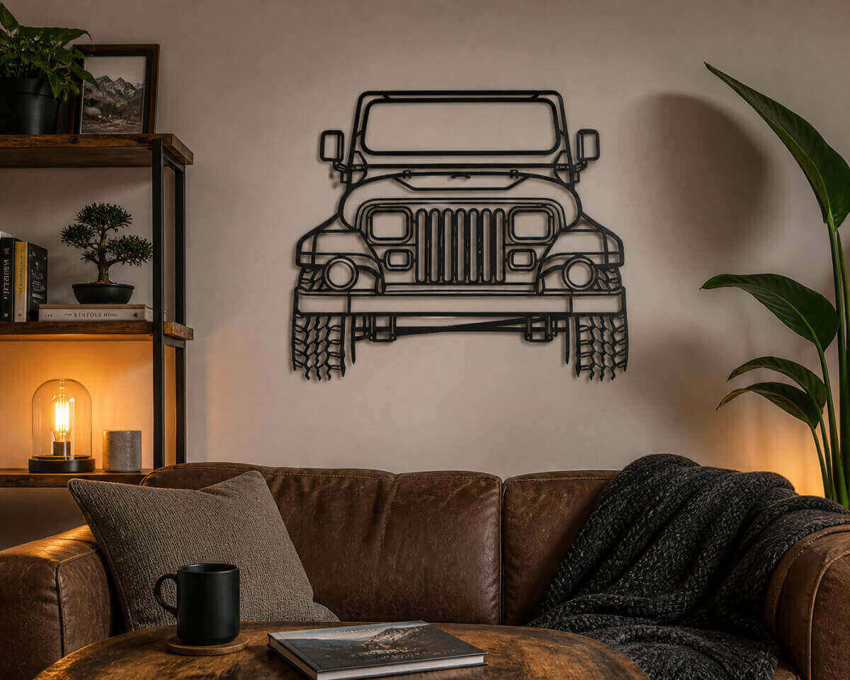 Jeep front-view metal wall art displayed above a leather sofa