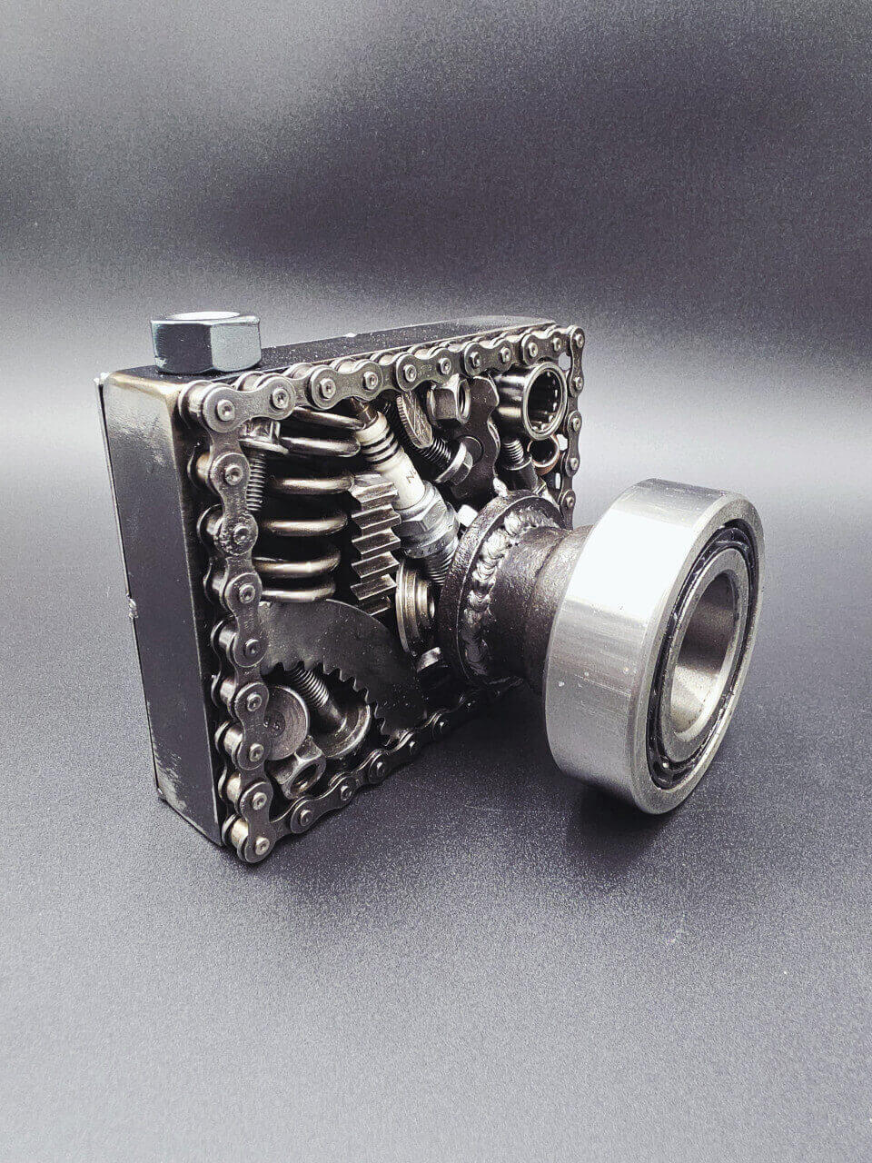 Make Memories one-off scrap metal camera sculpture made from automotive parts